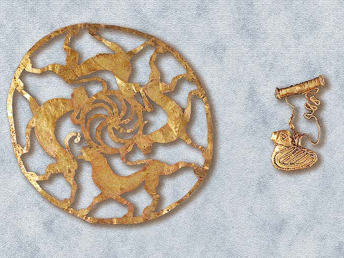 Pendagli in oro e argento, con castone in ambra e decorazioni in oro, alcuni di fattura raffinata (pendaglio a paperella decorata a filigrana).